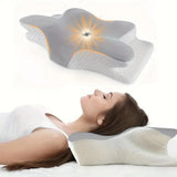 Oreiller cervical forme papillon gris clair, base blanche texturée, tête soutenue