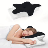 Oreiller cervical en mousse à mémoire, forme papillon noire, base blanche texturée