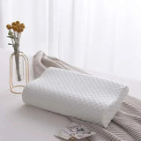 Oreiller cervical blanc en mousse à mémoire à picots, forme ergonomique