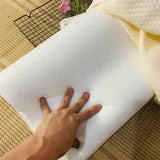 Oreiller cervical blanc en mousse à mémoire, surface à picots, compression légère